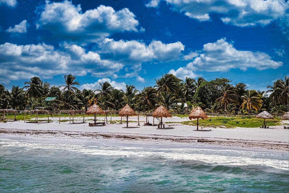 Beachfront Apartment Hacienda Dเอลกูโย ภายนอก รูปภาพ